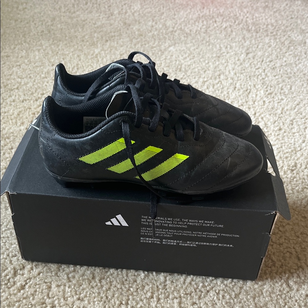 Adidas Soccer Cleats with Neon Green Stripes
